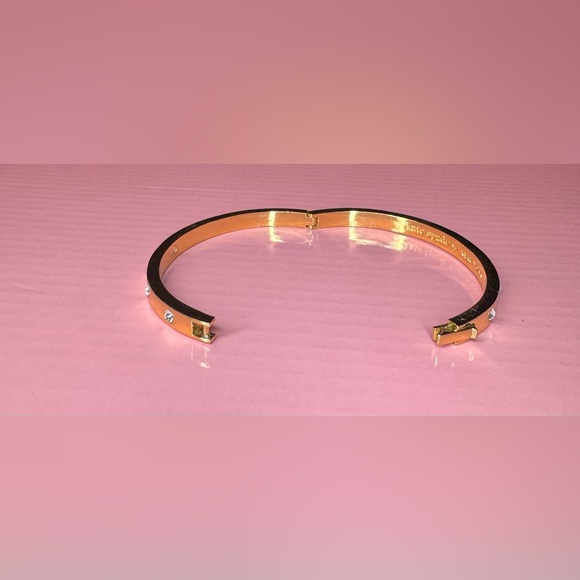 Kate Spade Stone Hinged Bangle in gold-tone plate with crystal embellishments. - Picture 4 of 5